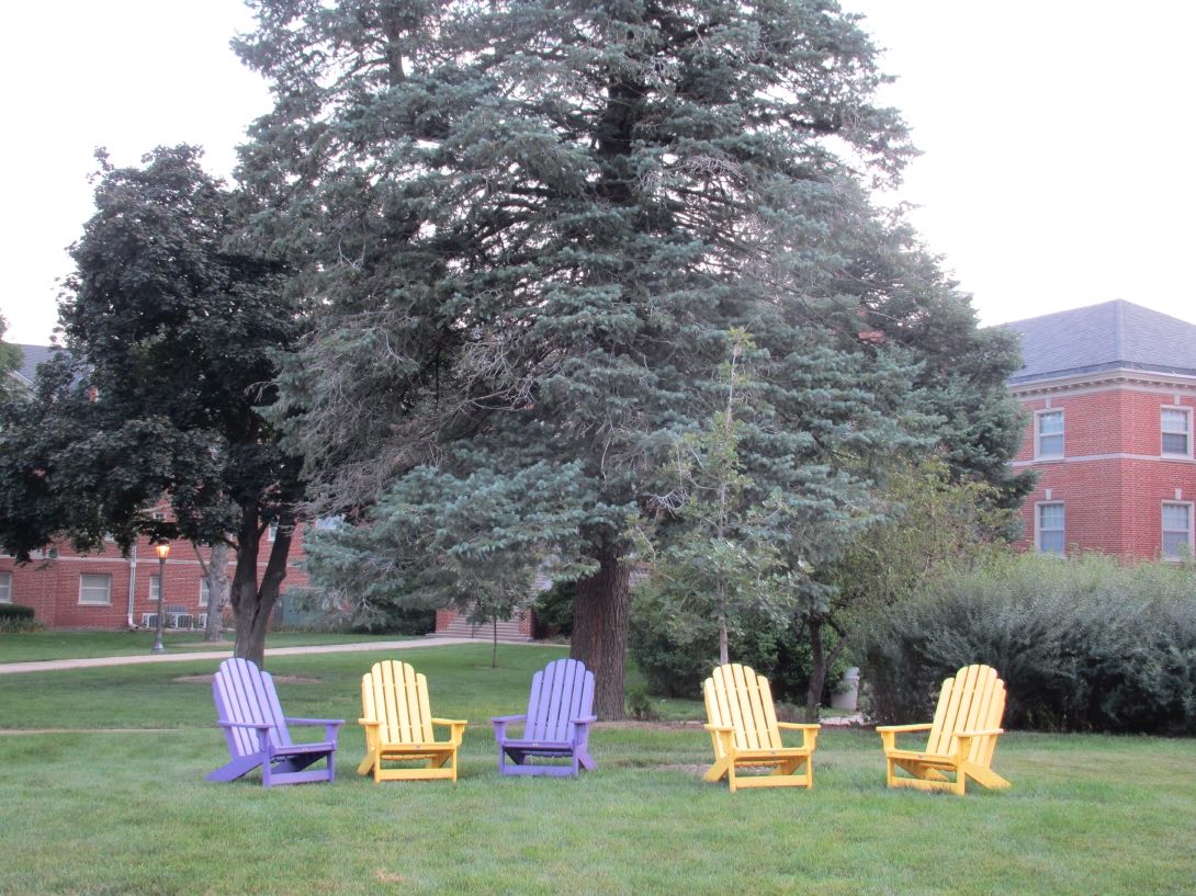 purple and gold chairs outside Bartlett Hall
