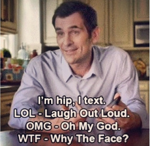 a meme of Phil Dunphy from Modern Family misunderstanding texting slang